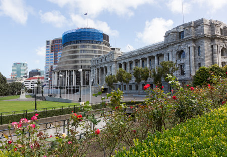New Zealand Parliament government building known as Beehive in Wellington with Parliament House in foregroundのeditorial素材