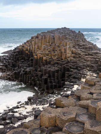Rocks forming detailed patterns at Giants Causeway in County Antrim Northern Irelandの写真素材