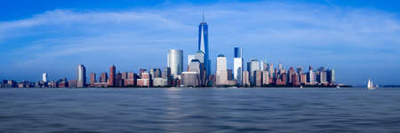 Panorama of lower Manhattan of New York City from Exchange Place at dusk with World Trade Center at full height of 1776 feetの写真素材