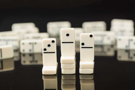 Winning domino above second and third place in concept image for success, innovation, leadership, winning and leader of the packの写真素材
