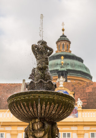 Fountain of Melk Abbey a Benedictine monastery overlooking river Danube in Melk, Austriaのeditorial素材