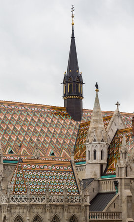 Detail of ornate carving and roof tiles on Mattias Church in Buda, Budapest, Hungaryのeditorial素材