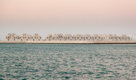 Construction of new apartment buildings on reclaimed land near the Royal Palace in Northern City, Bahrainのeditorial素材