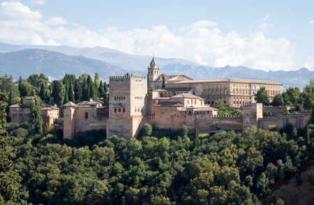 View of Nasrid Palace and church in Alhambra Palace from Mirador San Nicolas in ancient city of Granada in Andalucia, Spain, Europeのeditorial素材