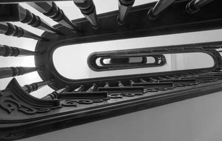 Wooden staircase inside Trans-Allegheny Lunatic Asylum which is a Kirkbride Psychiatric hospital  in Weston, West Virginia, USAの写真素材