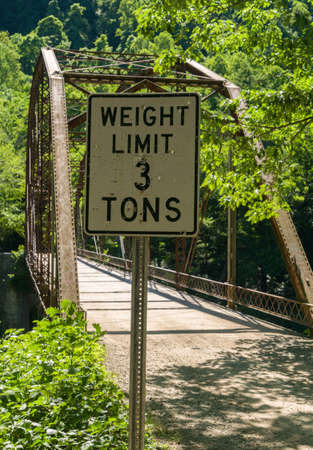 View of 1912 historic metal truss Jenkinsburg Bridge near Mt Nebo and Morgantown over Cheat Riverの写真素材