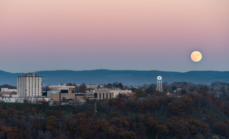 MORGANTOWN, WEST VIRGINIA, USA - NOVEMBER 13: Harvest Supermoon rises over the campus of West Virginia University in Morgantown WV on November 13, 2016. This moon is the closest to the earth for several decades.のeditorial素材