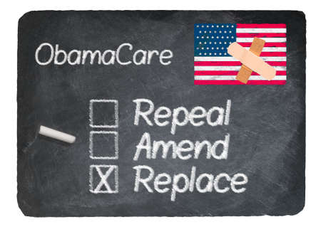Obamacare health plan choice for replace written in chalk on a chalky natural slate blackboard isolated against white backgroundの写真素材