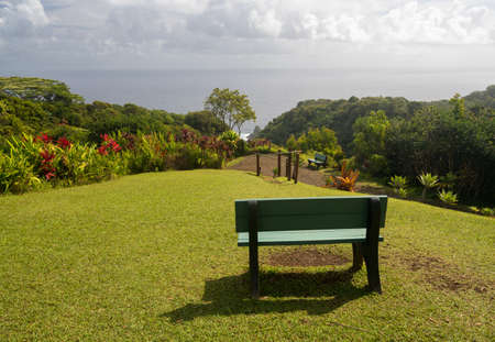 Keopuka rock overlook from garden with pacific ocean in the backgroundの写真素材