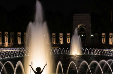 World War 2 memorial and fountains at night in Washington DCの写真素材