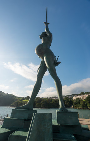 ILFRACOMBE, DEVON UK â JULY 24:  Sun illuminated Verity on 24 July 2017 in Ilfracombe, UK. The 25m tall Damien Hirst statue Verity was erected in 2012のeditorial素材