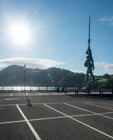 ILFRACOMBE, DEVON UK â JULY 24:  Sun illuminated Verity on 24 July 2017 in Ilfracombe, UK. The 25m tall Damien Hirst statue Verity was erected in 2012のeditorial素材