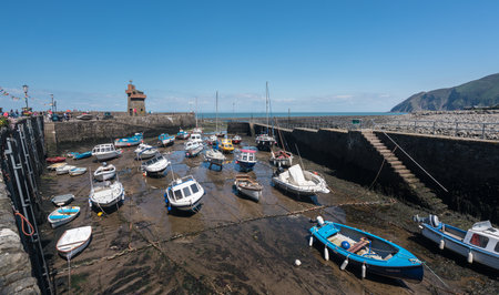 LYNMOUTH, DEVON UK â JULY 24:  Mud in harbor at low tide on 24 July 2017 in Ilfracombe, UK. The village was disastrously flooded in August 1952.のeditorial素材