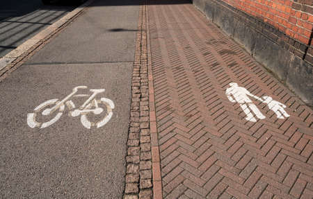 Painted signs for cycling and for pedestrians in Helsinkiの写真素材