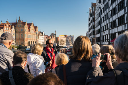 GDANSK, POLAND - 16 SEPTEMBER: Tourists visiting the old town on 16 September 2017 in Gdansk, Poland. The main buildings were rebuilt after the 2nd World War.のeditorial素材