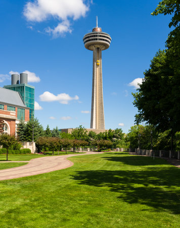 NIAGARA FALLS, CANADA - JUNE 29, 2016: Skylon Tower and observation deck above gardens of Fallsview Casino Resort in Niagara Falls, Ontario, Canadaのeditorial素材