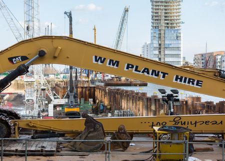 LONDON, UK - JANUARY 30, 2016: Cranes and building work in construction site for new building in...