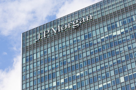 LONDON, UK - JANUARY 30, 2016: Logo or sign for JP Morgan Bank on side of office building in Canary...