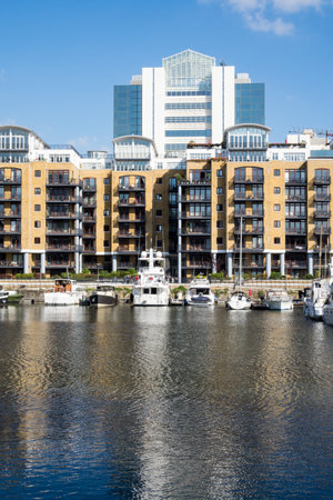 LONDON, UK - OCTOBER 1, 2015: View of the boats and barges in St Katherines Dock in London, Englandのeditorial素材