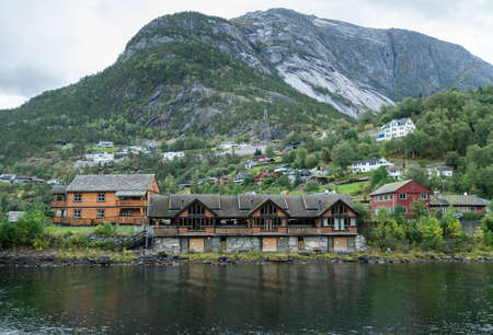 Small town of Eidfjord in Norway with clear waters of the fjordの写真素材