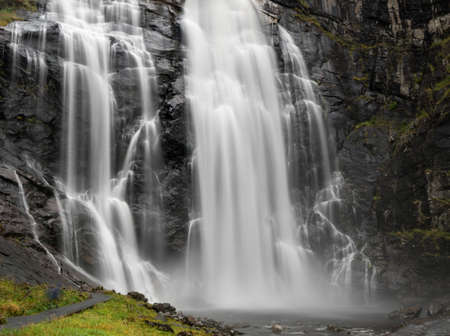 Dramatic Skjervsfossen waterfall near Skjervet road between Granvin and Voss in Norway