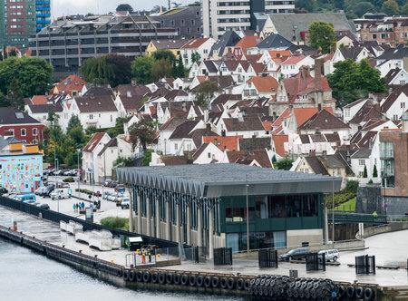 STAVANGER, NORWAY - SEPTEMBER 20, 2017: Cruise ship dock and old town by Stavanger Harbor.のeditorial素材