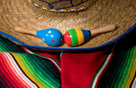 Cinco de Mayo background image on with maracas and sombrero on wooden rustic boardsの写真素材