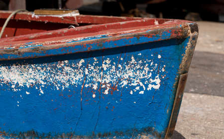Damaged paint on fishing boat at Camara de Lobos on island of Madiera