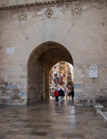 VALENCIA, SPAIN - MARCH 16, 2018: City Gate between two towers in old city of Valencia on coast of Spainのeditorial素材