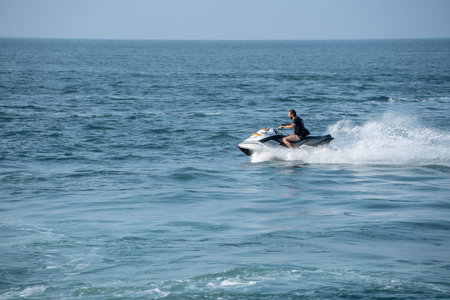 ILFRACOMBE, DEVON, UK - MAY 7, 2018: Waverunner or personal water craft in the ocean off Ilfracombe...