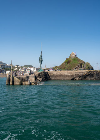 ILFRACOMBE, DEVON, UK MAY 7, 2018: Damien Hirst statue Verity at the entrance to Ilfracombe harbourのeditorial素材