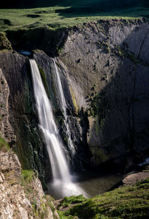 Spekes Mill Mouth waterfall near Hartland Quay in North Devon, England