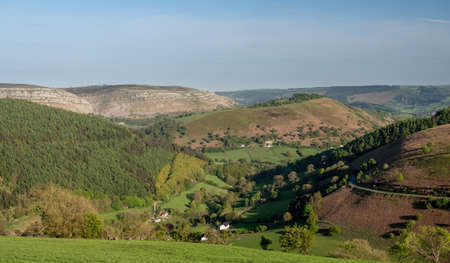 Road and valley up and over Horseshoe pass near Llangollen in Wales