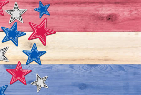 Timber planks of wood that have been painted or stained in the colors of a flag for USA for fourth...