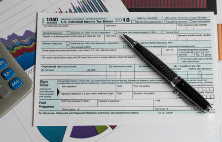 New Form 1040 Simplified for 2018 allows for filing on April 15, tax day, on a postcardの写真素材