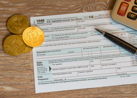 New Form 1040 Simplified for 2018 with bitcoin coins for reporting of gains from currency trading