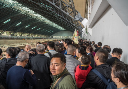 XIAN, CHINA - 17 OCTOBER 2018: Tourists inside building housing the pottery terracotta army warriorsのeditorial素材