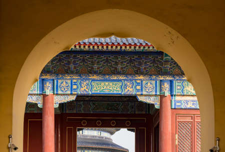 Temple of Heaven viewed through the entrance doorway and arch in Beijing, China