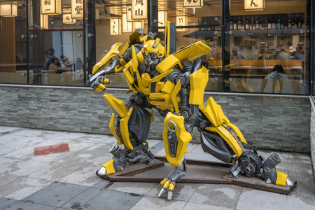 BEIJING, CHINA - 20 OCTOBER 2018: Yellow model of Transformers robot in The Place shopping mallのeditorial素材