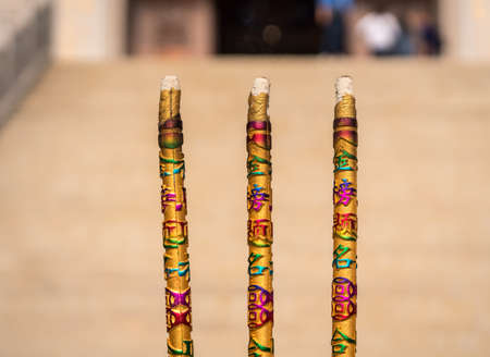 Burning incense at Temple of Supreme Purity or Tai Qing Gong at Laoshanの写真素材