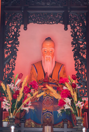 QINGDAO, CHINA - 24 OCTOBER, 2018: Altar statue in a temple at Temple of Supreme Purity or Tai Qing Gong at Laoshanのeditorial素材