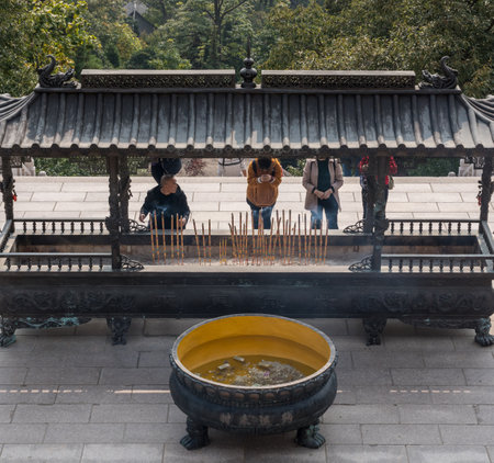 QINGDAO, CHINA - 24 OCTOBER 2018: Burning incense at Temple of Supreme Purity or Tai Qing Gong at Laoshanのeditorial素材