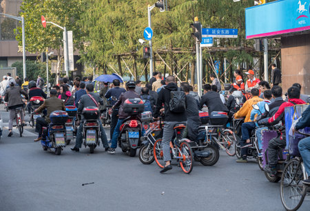 SHANGHAI - CHINA - 26 OCTOBER 2018: Sichuan Road is a cross city route for bicycles and scooters