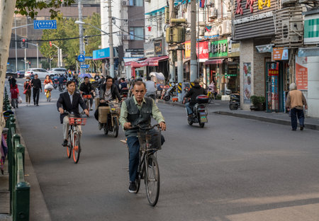 SHANGHAI - CHINA - 26 OCTOBER 2018: Sichuan Road is a cross city route for bicycles and scootersのeditorial素材