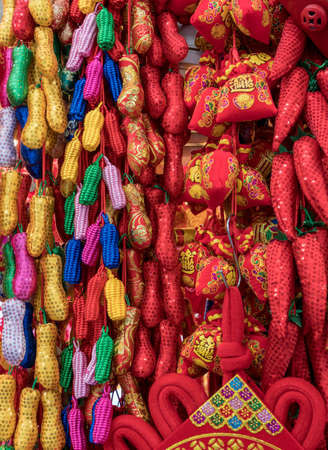 Chinese red new year gifts and decorations with red tassels with gold lettering