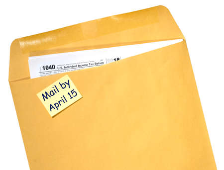 Printed copy of Form 1040 for income tax return for 2018 with reminder for April 15, 2019 deadline