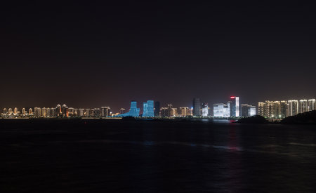 XIAMEN, CHINA - OCTOBER 30, 2018: Illuminated light show on apartments and office buildings of Xiamenのeditorial素材
