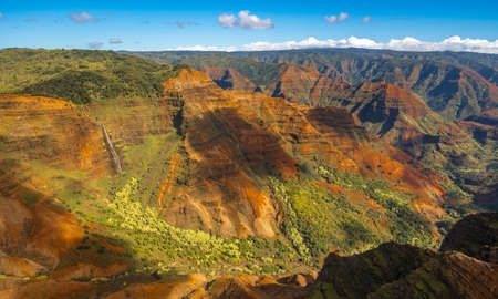 Aerial view of Waipoo waterfall and landscape of Waimea Canyon of Kauai from helicopter flightの写真素材