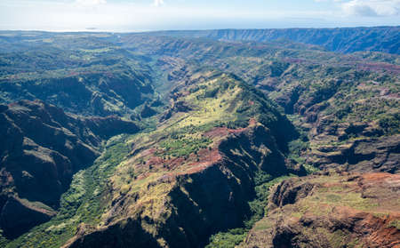 Aerial view of Waimea Canyon and landscape of hawaiian island of Kauai from helicopter flightの写真素材