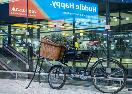 LONDON, UK - 24 APRIL 2019: Bicycle with lavender flowers inside Queens Terminal at London Heathrowのeditorial素材